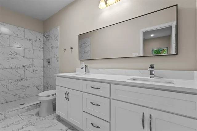a view of kitchen with wooden floor and electronic appliances