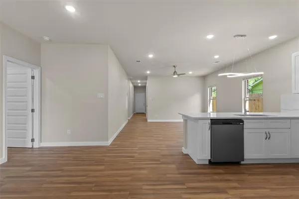 a swimming pool with wooden fence