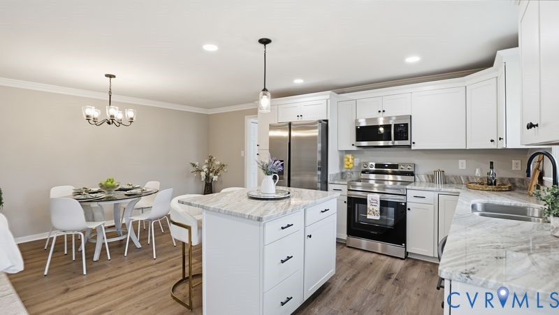 25209 Ritchie Avenue Petersburg, VA 23803 - Photo 14 of 50 Kitchen with stainless steel appliances, white cab