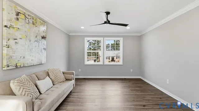 a living room with furniture and window