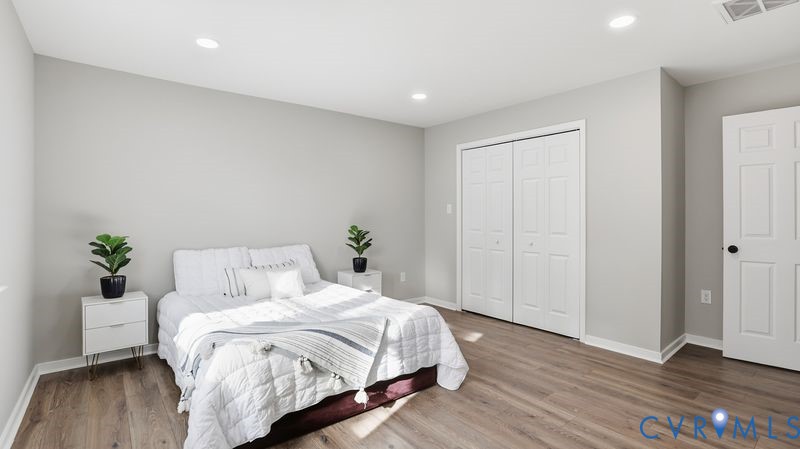 25209 Ritchie Avenue Petersburg, VA 23803 - Photo 23 of 50 Bedroom with wood finished floors, recessed lighti