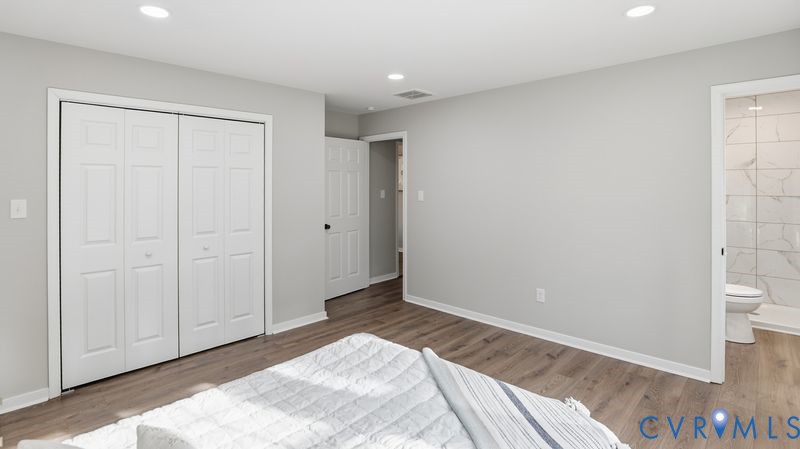 25209 Ritchie Avenue Petersburg, VA 23803 - Photo 28 of 50 Unfurnished bedroom with a closet, wood finished f