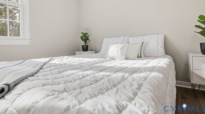25209 Ritchie Avenue Petersburg, VA 23803 - Photo 29 of 50 Bedroom with dark wood-style flooring and baseboar
