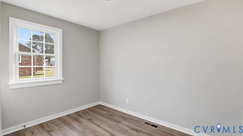 25209 Ritchie Avenue Petersburg, VA 23803 - Photo 38 of 50 Spare room with baseboards and light wood-style fl