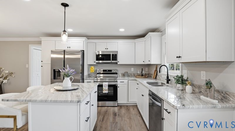 25209 Ritchie Avenue Petersburg, VA 23803 - Photo 5 of 50 Kitchen featuring a breakfast bar, appliances with