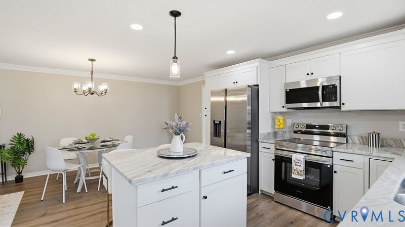 25209 Ritchie Avenue Petersburg, VA 23803 - Photo 6 of 50 Kitchen with stainless steel appliances, white cab