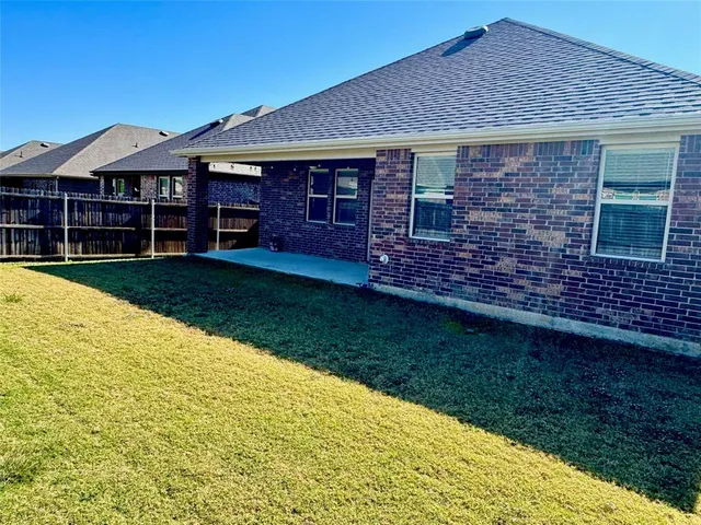 a view of a house with garden
