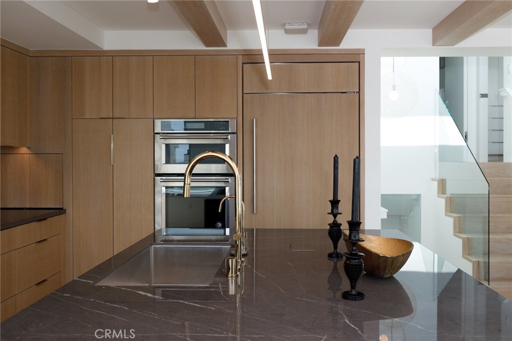 4310 Ocean Drive Manhattan Beach, CA 90266 - Photo 13 of 54 a bathroom with a sink and a toilet
