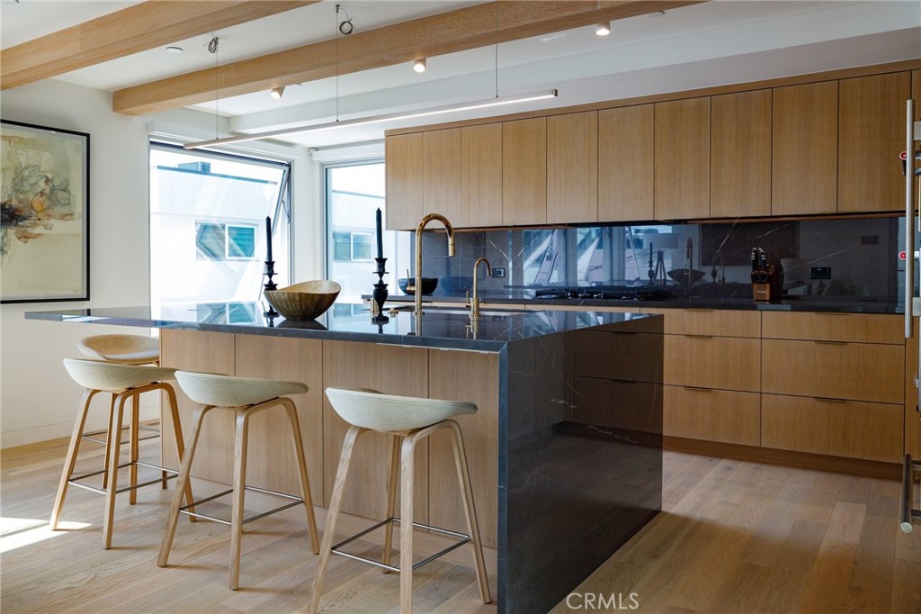 4310 Ocean Drive Manhattan Beach, CA 90266 - Photo 21 of 54 a kitchen with a sink cabinets and window