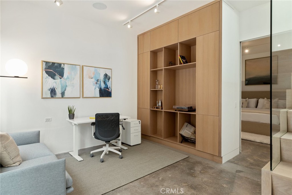 4310 Ocean Drive Manhattan Beach, CA 90266 - Photo 40 of 54 a work room with furniture and windows