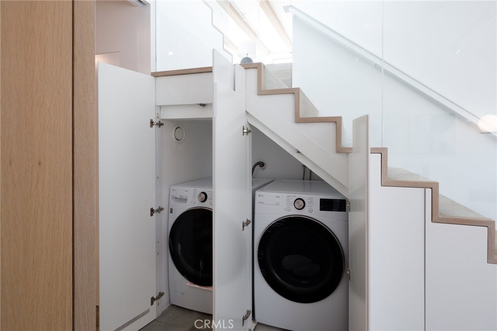 4310 Ocean Drive Manhattan Beach, CA 90266 - Photo 46 of 54 a utility room with dryer and washer