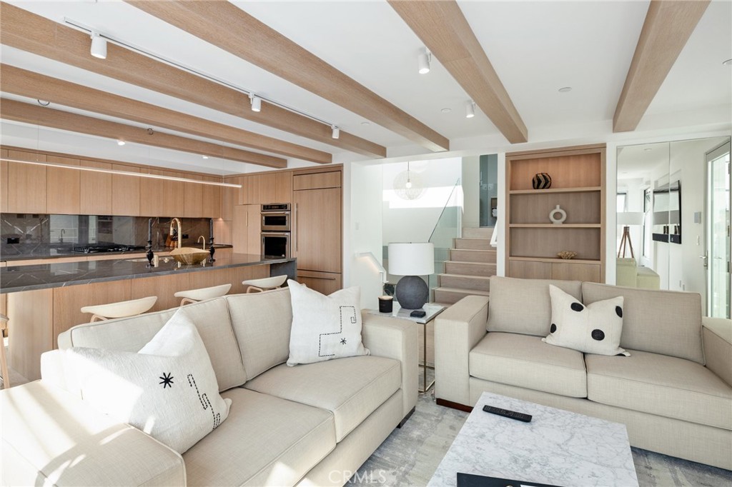 4310 Ocean Drive Manhattan Beach, CA 90266 - Photo 5 of 54 a living room with furniture and view of kitchen