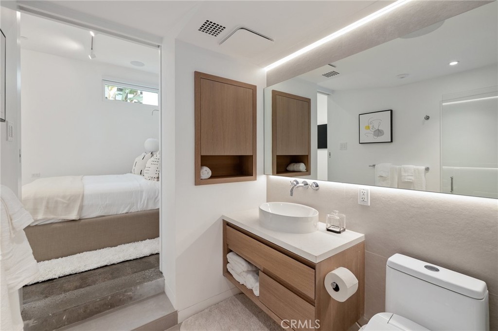 4310 Ocean Drive Manhattan Beach, CA 90266 - Photo 51 of 54 a bathroom with a sink and a mirror