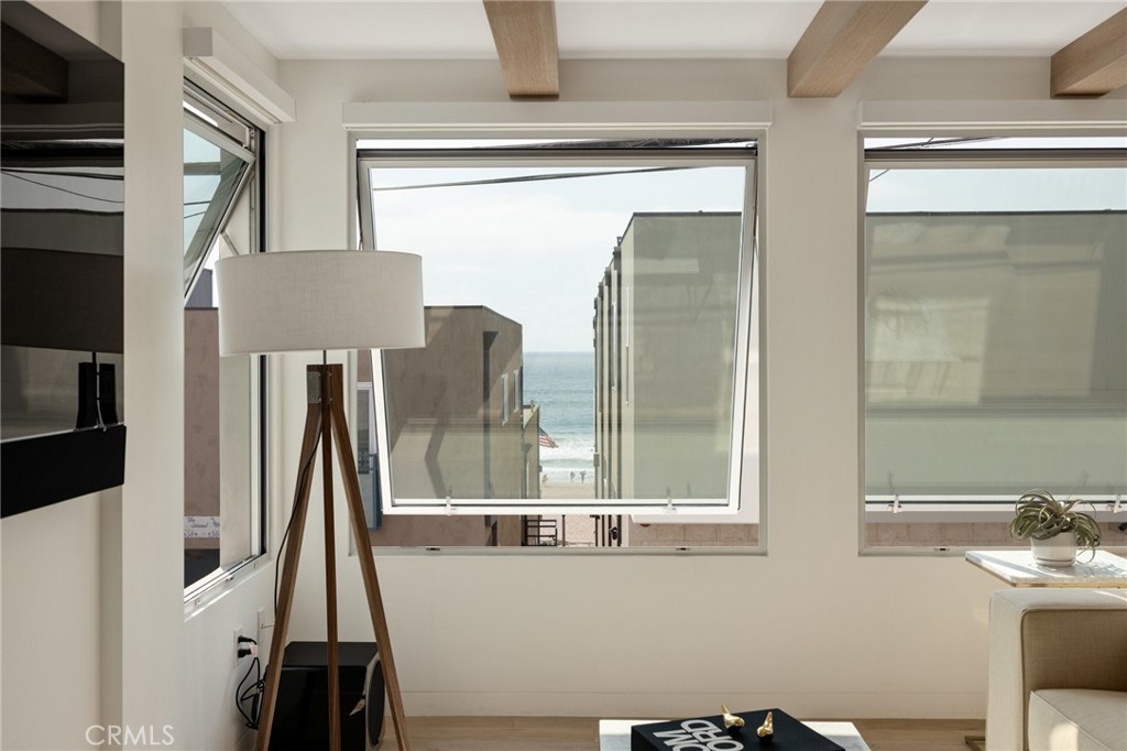 4310 Ocean Drive Manhattan Beach, CA 90266 - Photo 9 of 54 a view of a room with furniture and a window