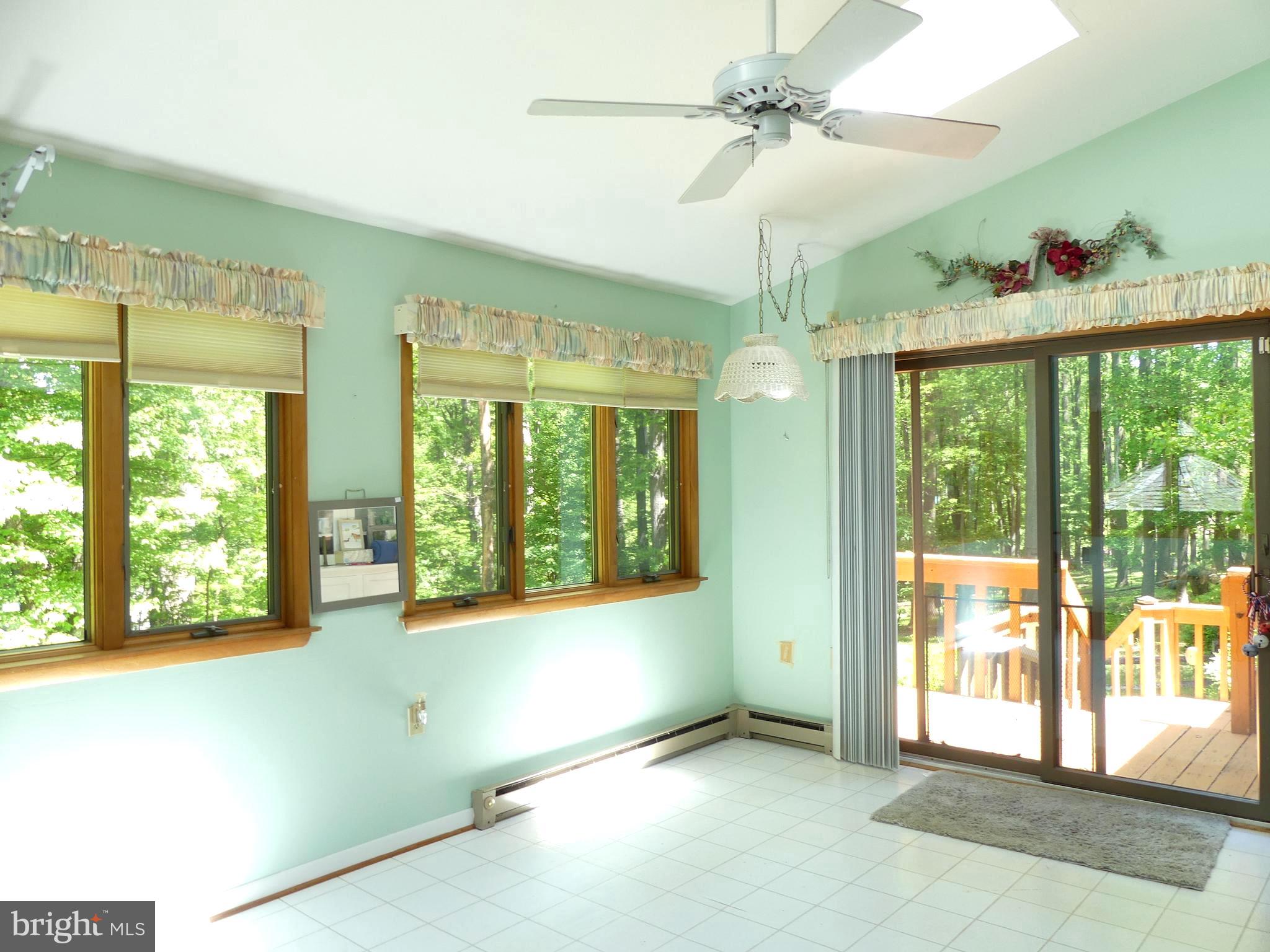 12610 Timber Grove Road Reisterstown, MD 21136 - Photo 11 of 42 Greet the new day from the sun room