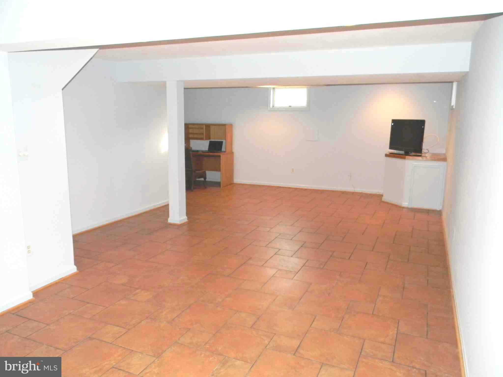 1603 Stowe Road Reston, VA 20194 - Photo 22 of 30 a view of empty room with wooden floor