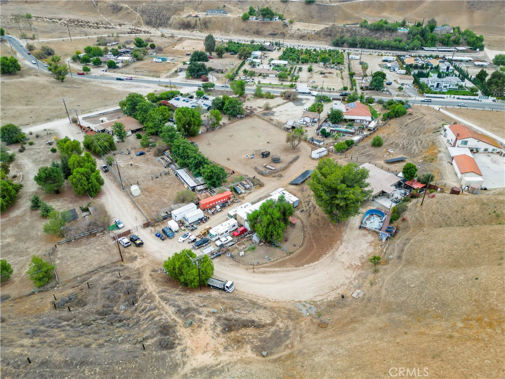 24444 Scotch Lane Colton, CA 92324 - Photo 31 of 43 an aerial view of a house with a yard and lake view