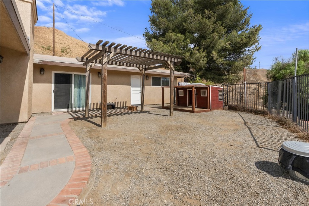 24444 Scotch Lane Colton, CA 92324 - Photo 40 of 43 a view of a house with a sink and a yard