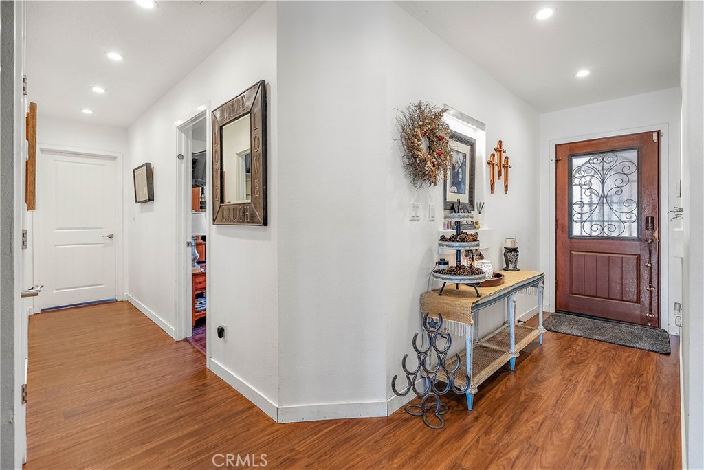 24444 Scotch Lane Colton, CA 92324 - Photo 6 of 43 a view of a workspace with furniture and wooden floor