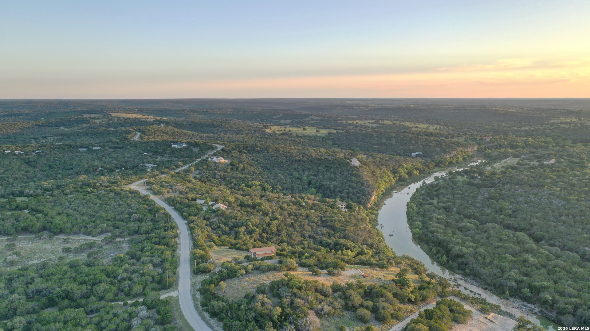 189 Cherry Springs Road Hunt, TX 78024 - Photo 23 of 34 an aerial view of a house with a yard