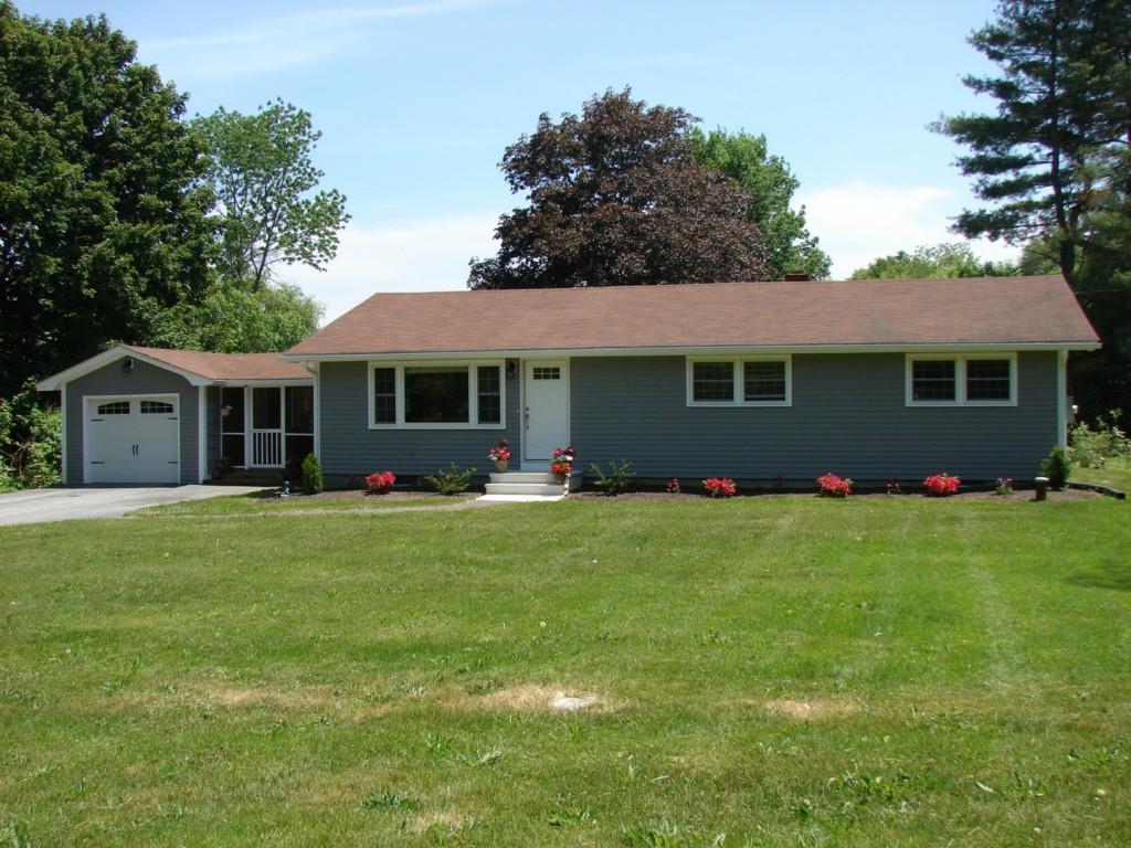 45 Child Hill Road Woodstock, CT 06281 - Photo 1 of 1 a front view of house with yard and green space
