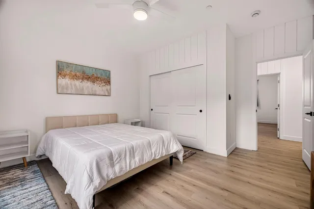a bathroom with a shower and a sink