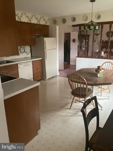 a dinning room with furniture