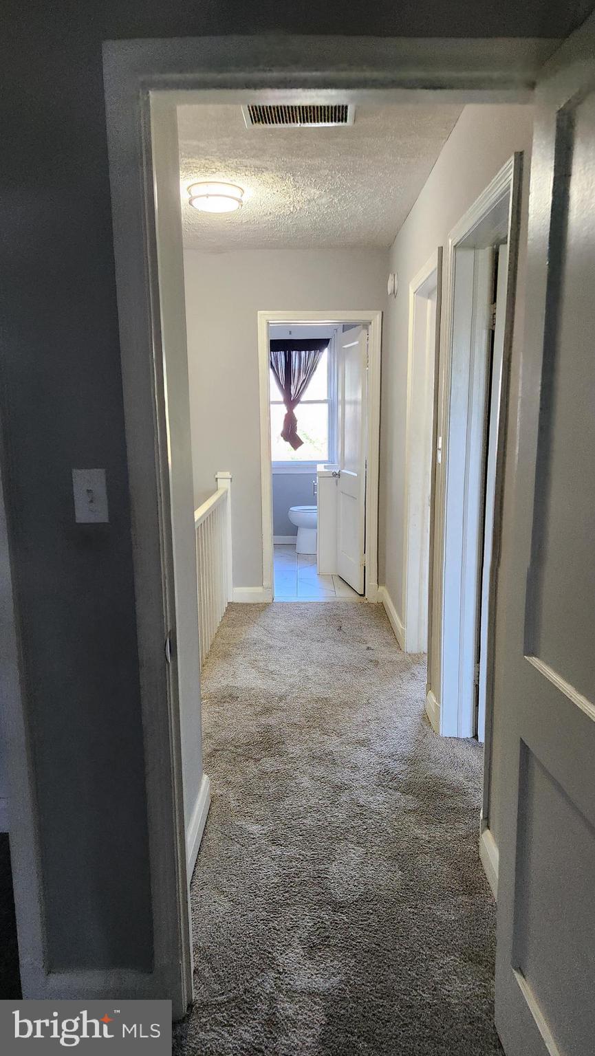 1024 Wicklow Road Baltimore, MD 21229 - Photo 15 of 44 a view of hallway with window and front door