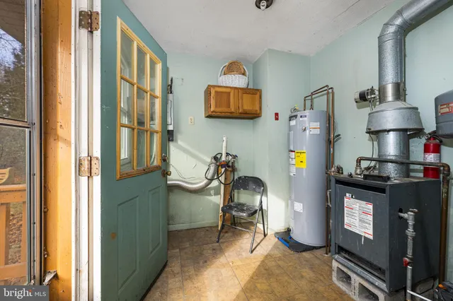 a room with furniture and a flat screen tv