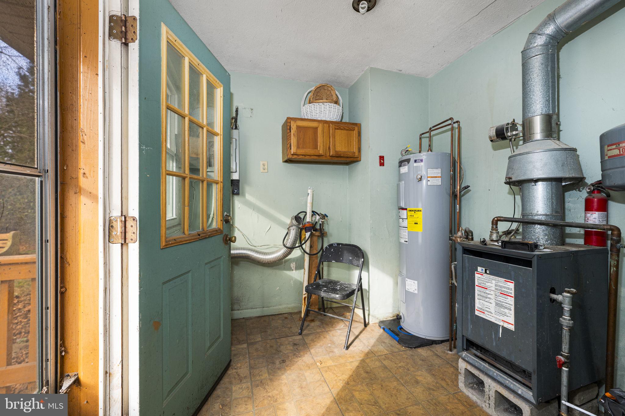 1016 West Boot Road Downingtown, PA 19335 - Photo 21 of 30 a room with furniture and a flat screen tv