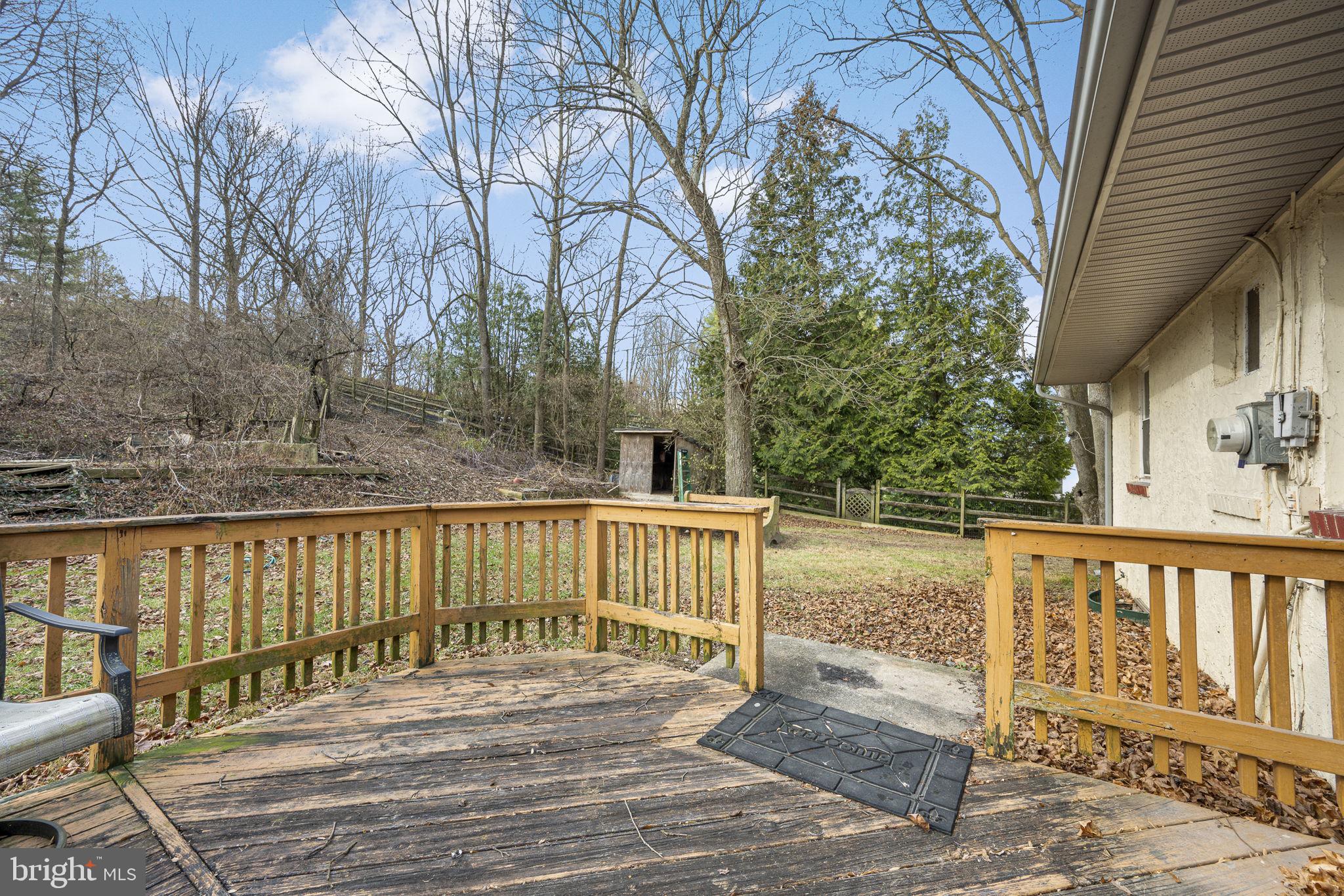 1016 West Boot Road Downingtown, PA 19335 - Photo 23 of 30 a view of a balcony with wooden floor and fence