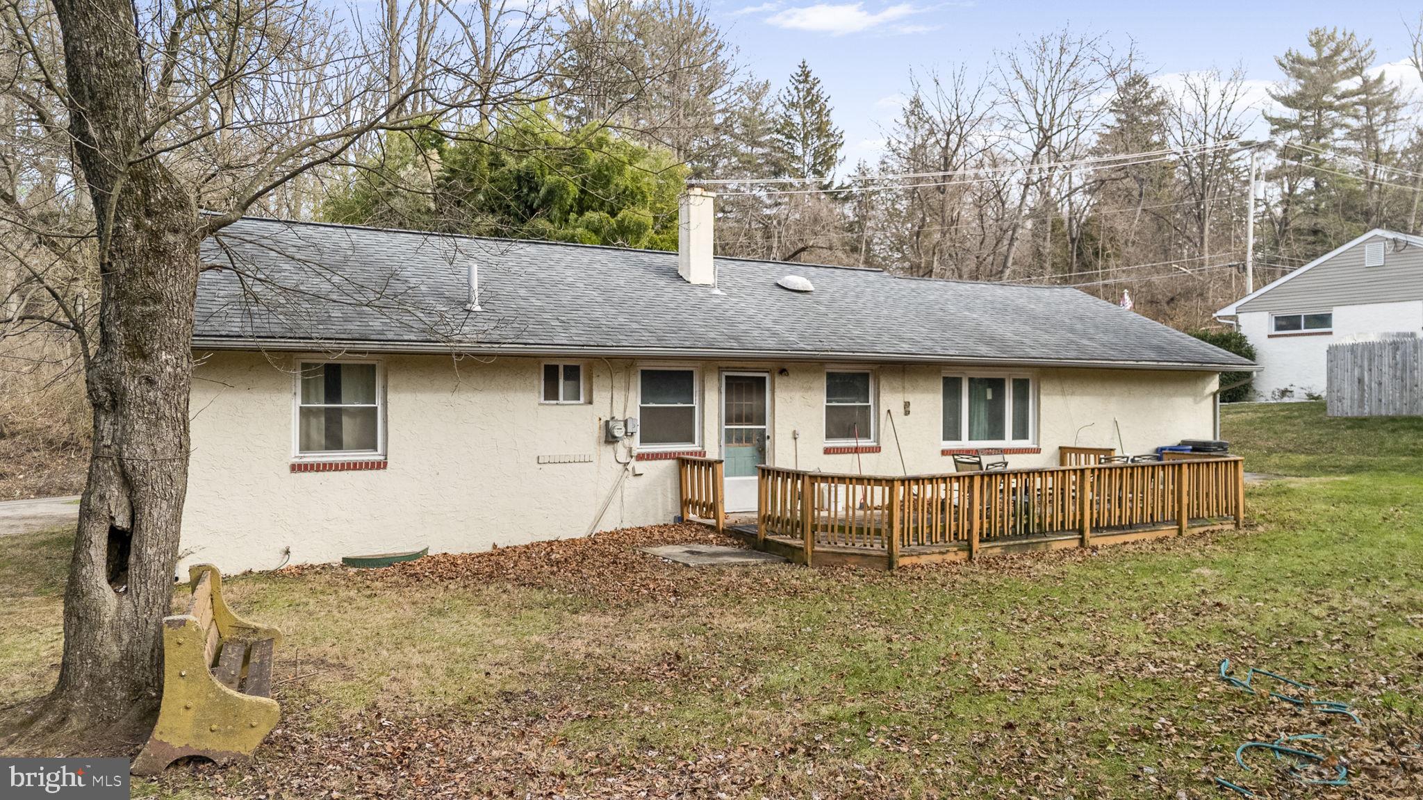 1016 West Boot Road Downingtown, PA 19335 - Photo 25 of 30 a view of a house with a yard and sitting area