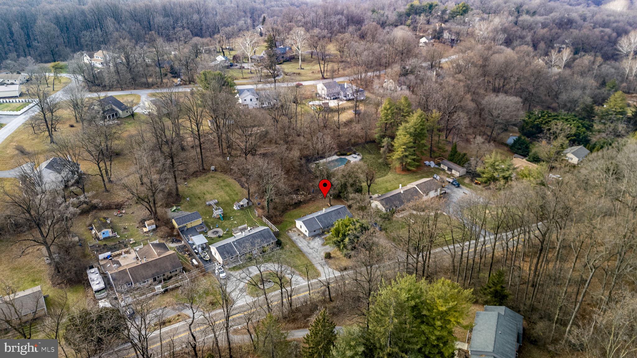 1016 West Boot Road Downingtown, PA 19335 - Photo 29 of 30 an aerial view of residential house with outdoor space and trees