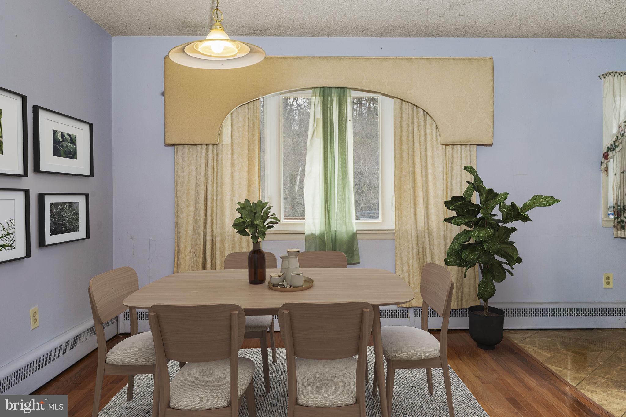 1016 West Boot Road Downingtown, PA 19335 - Photo 8 of 30 a dining room with furniture potted plants and wooden floor