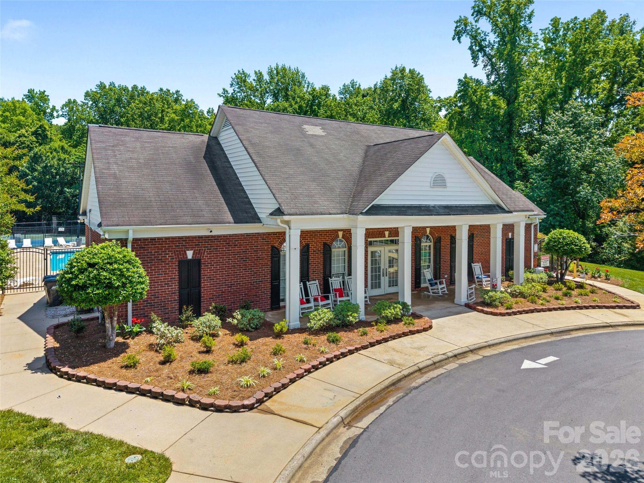 620 East Cheval Drive Fort Mill, SC 29708 - Photo 44 of 48 a front view of a house with garden