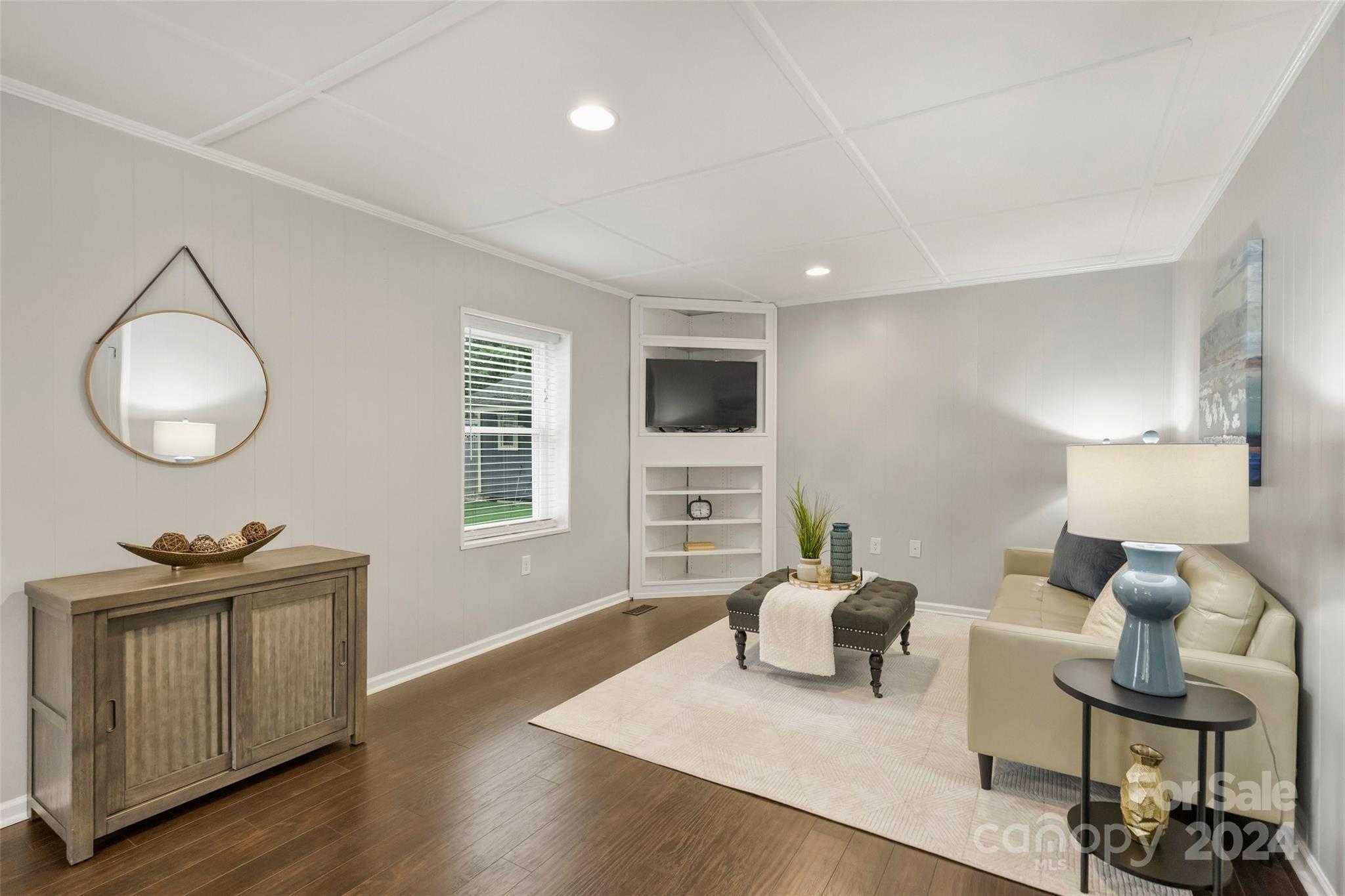 515 Bartling Road Charlotte, NC 28209 - Photo 18 of 42 a living room with furniture a window and a lamp