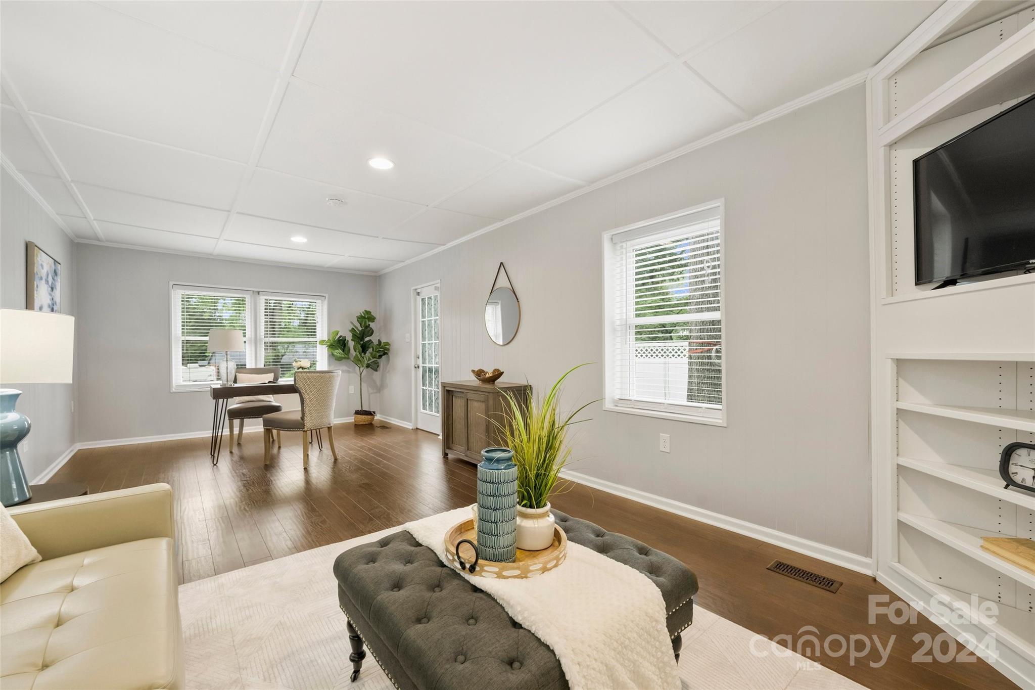 515 Bartling Road Charlotte, NC 28209 - Photo 19 of 42 a living room with fireplace furniture and a flat screen tv