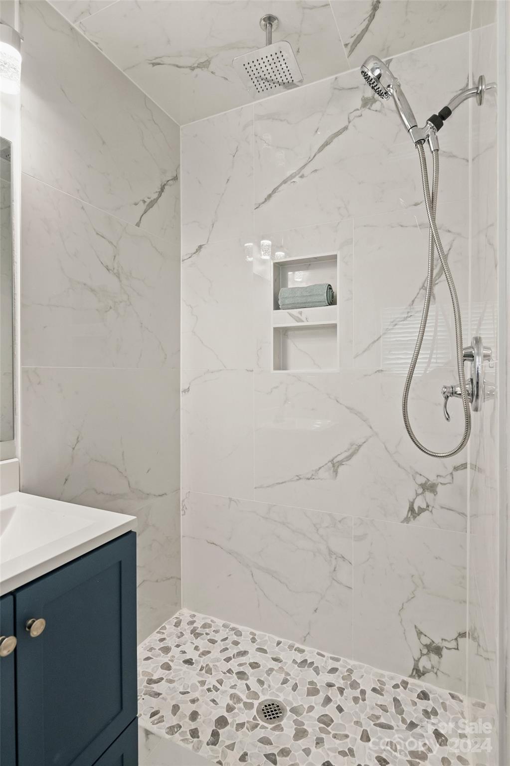 515 Bartling Road Charlotte, NC 28209 - Photo 23 of 42 a bathroom with a shower