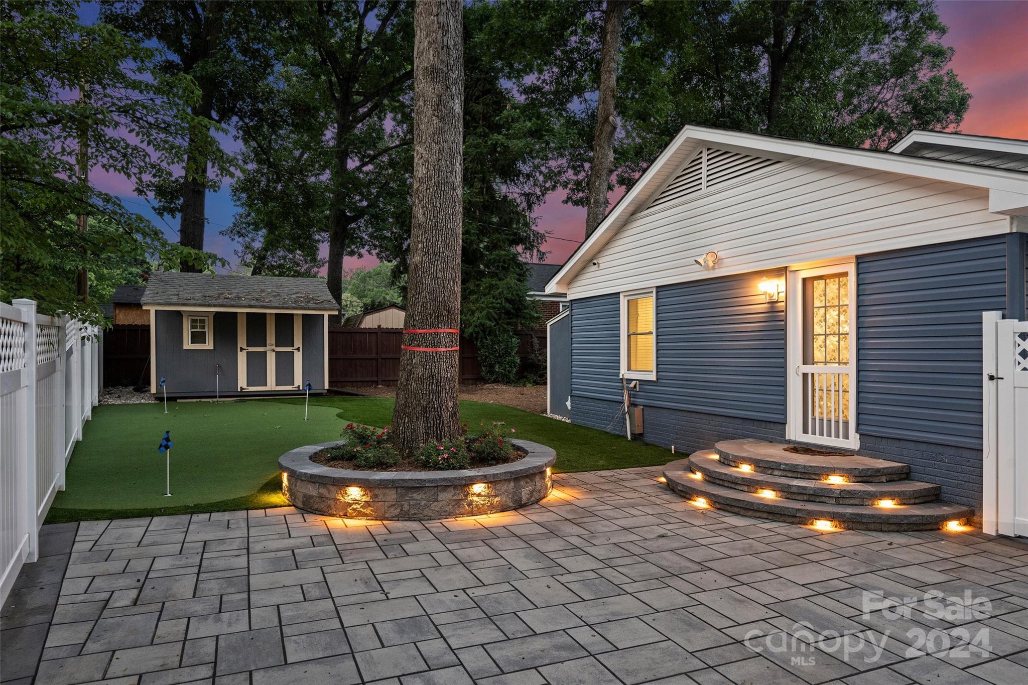515 Bartling Road Charlotte, NC 28209 - Photo 32 of 42 a view of a house with backyard and garden