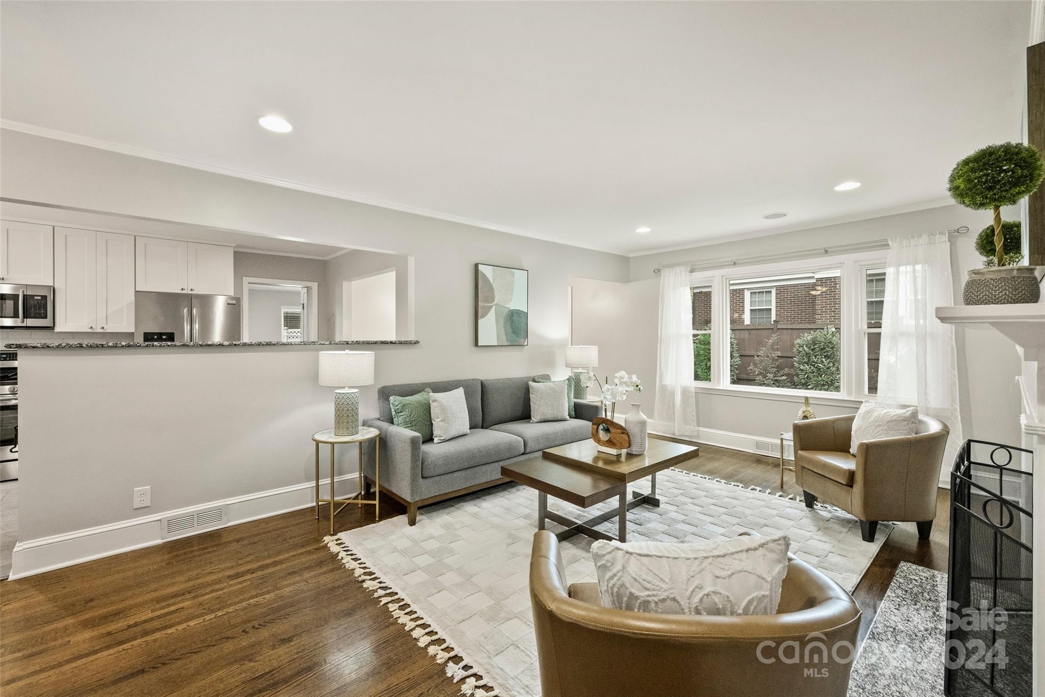 515 Bartling Road Charlotte, NC 28209 - Photo 5 of 42 a living room with furniture and a table