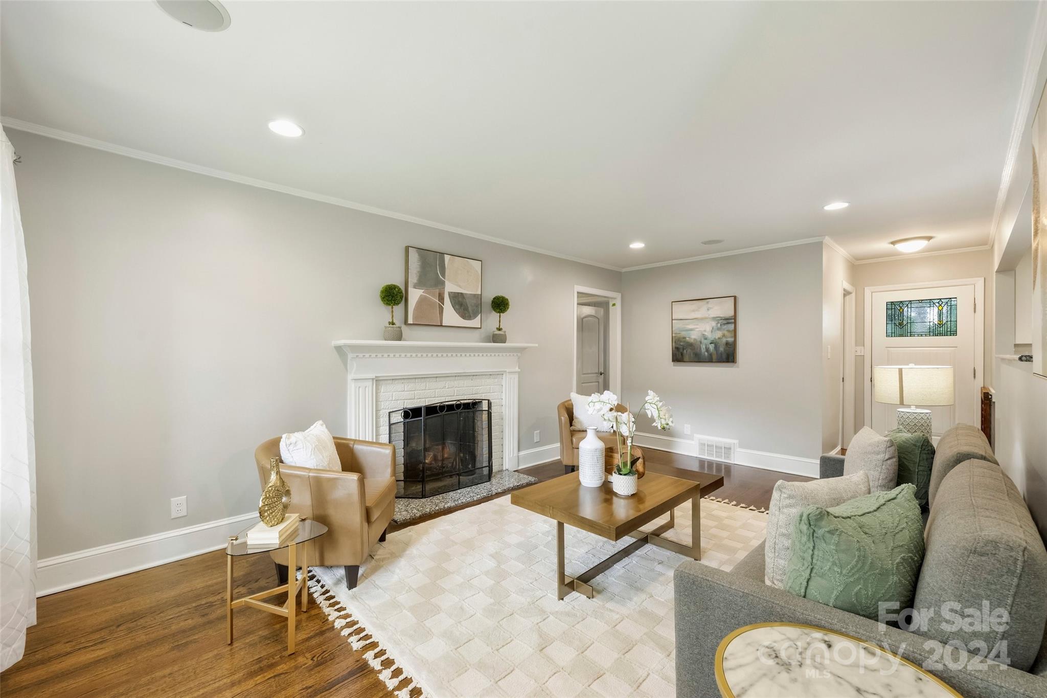 515 Bartling Road Charlotte, NC 28209 - Photo 7 of 42 a living room with furniture and a fireplace