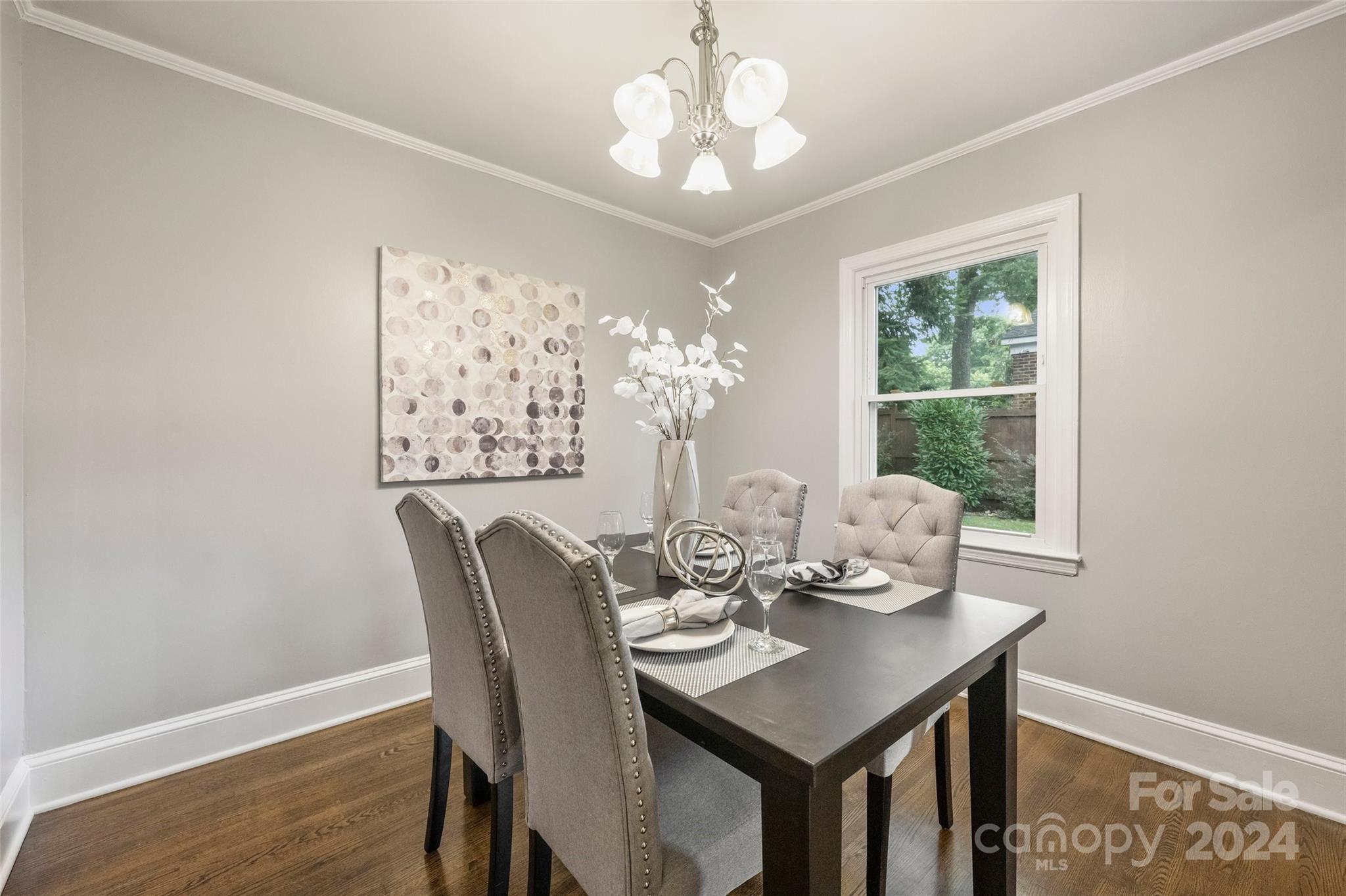 515 Bartling Road Charlotte, NC 28209 - Photo 8 of 42 a view of a dining room with furniture window and wooden floor