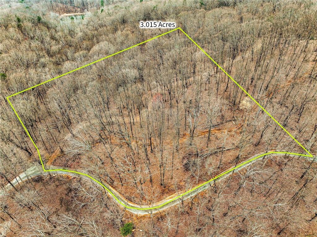 Lot 3 Mount Mincie Road Murrayville, GA 30564 - Photo 7 of 15 a bath tub sitting next to a road