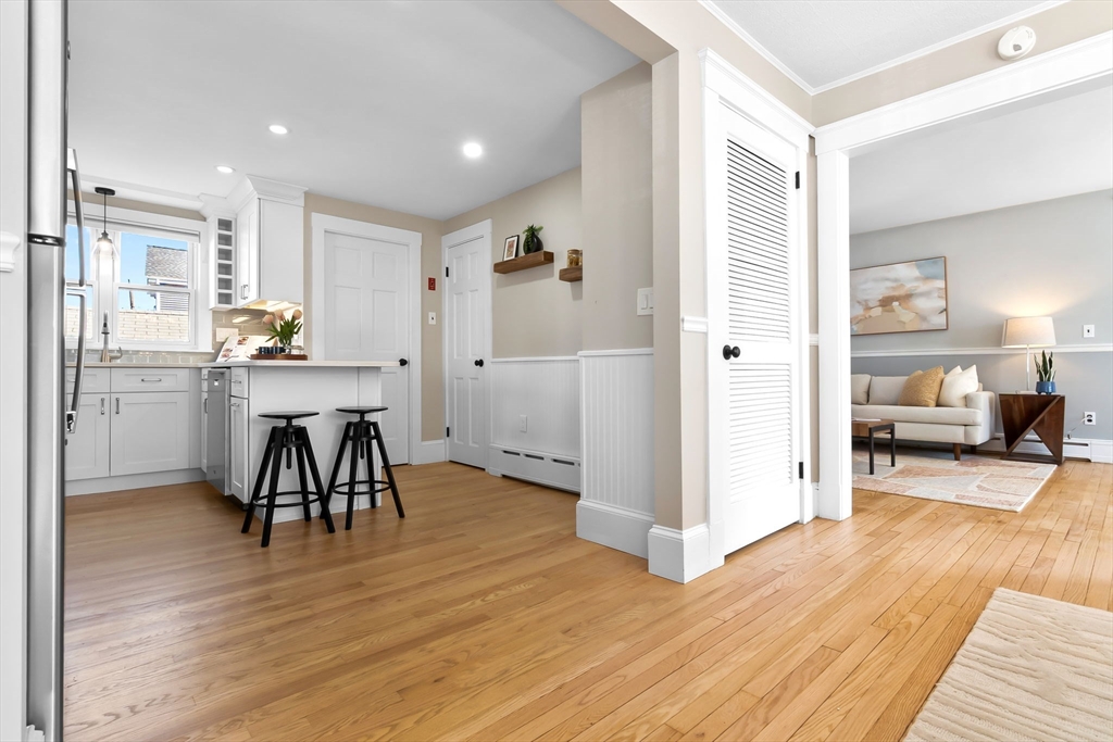 17 Coolidge Street Stoneham, MA 02180 - Photo 12 of 37 a view of a kitchen and dining room