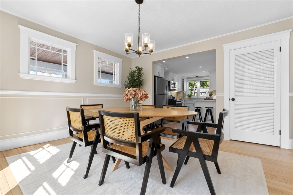 17 Coolidge Street Stoneham, MA 02180 - Photo 14 of 37 a view of a dining room with furniture and a chandelier