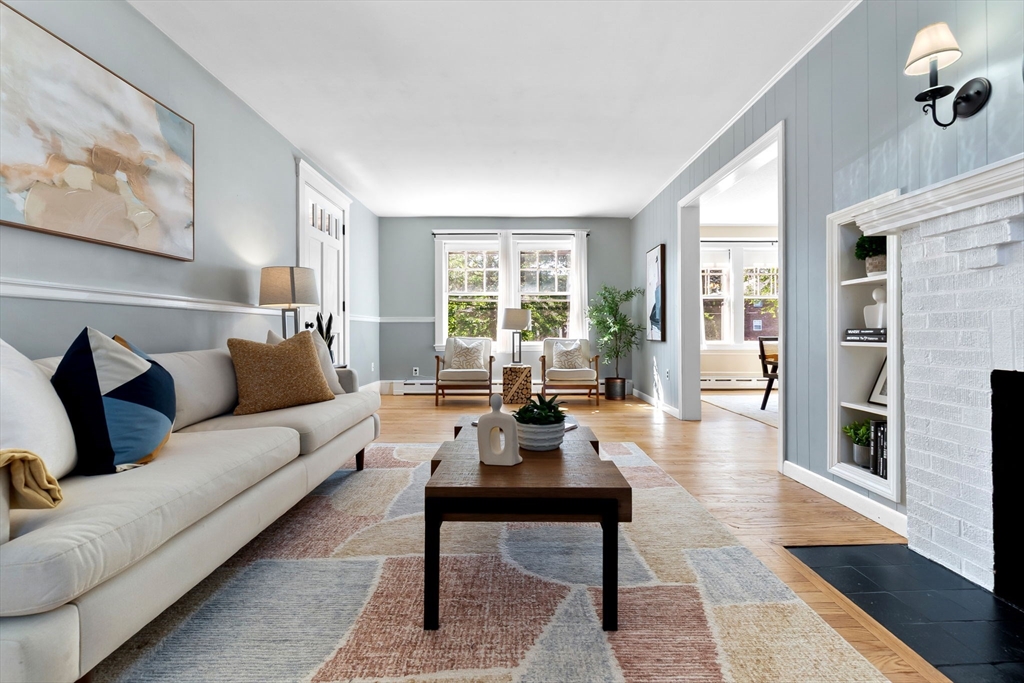 17 Coolidge Street Stoneham, MA 02180 - Photo 18 of 37 a living room with furniture a rug and a large window