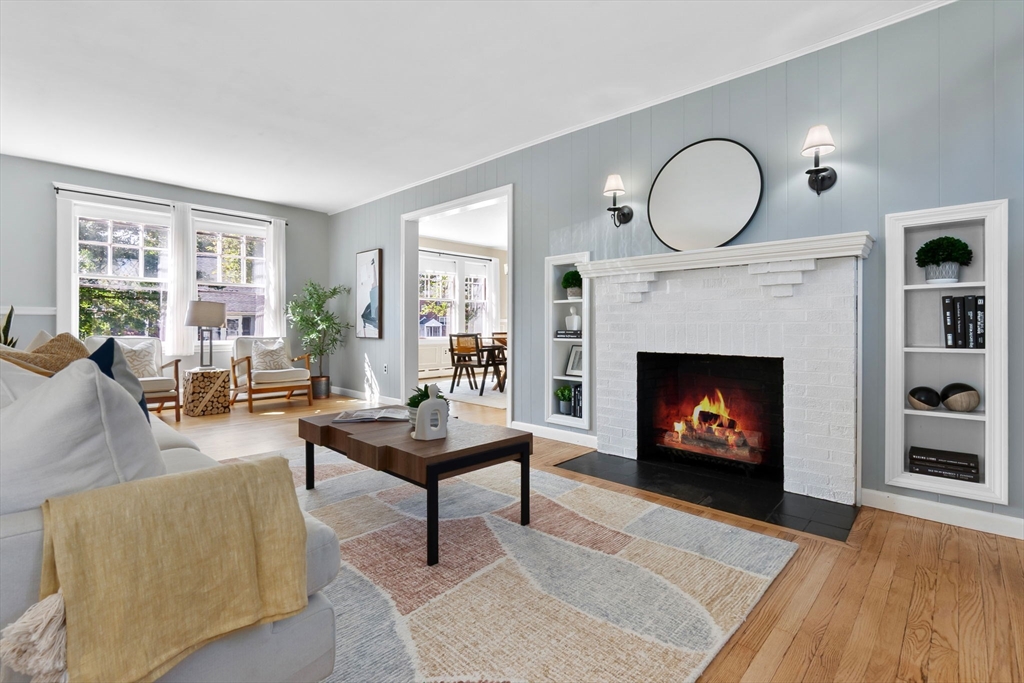17 Coolidge Street Stoneham, MA 02180 - Photo 19 of 37 a living room with furniture and a fireplace