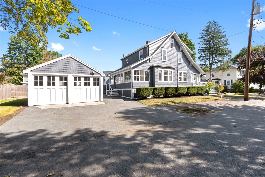 17 Coolidge Street Stoneham, MA 02180 - Photo 2 of 37 a front view of a house with a yard