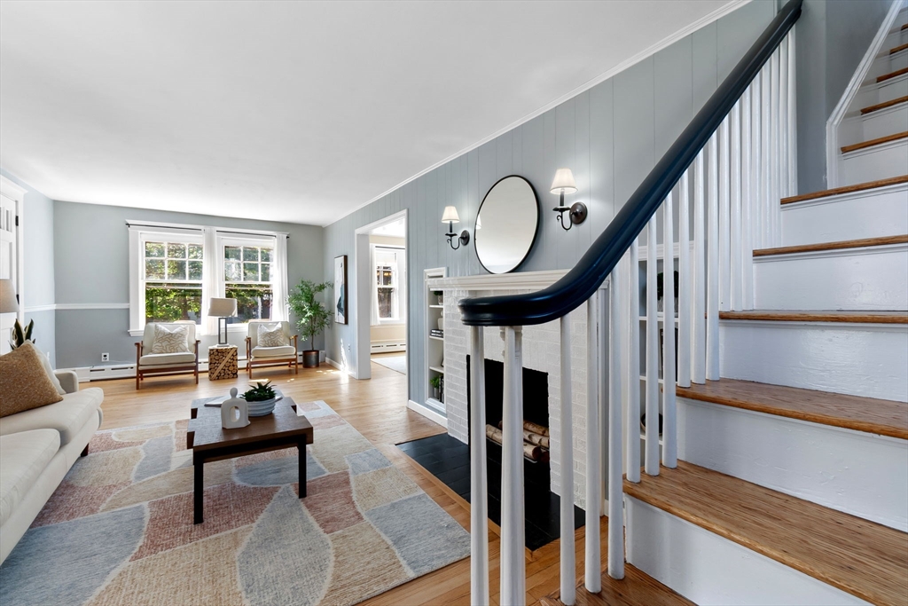 17 Coolidge Street Stoneham, MA 02180 - Photo 24 of 37 a living room with furniture and a large window