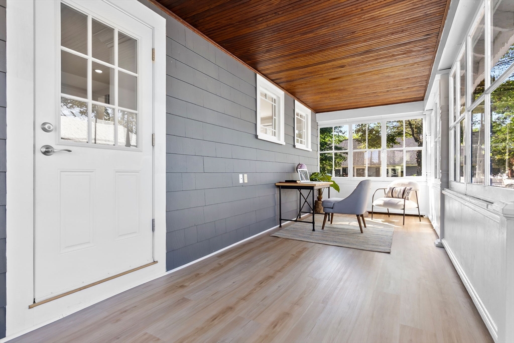 17 Coolidge Street Stoneham, MA 02180 - Photo 3 of 37 wooden bench sitting in front of a house